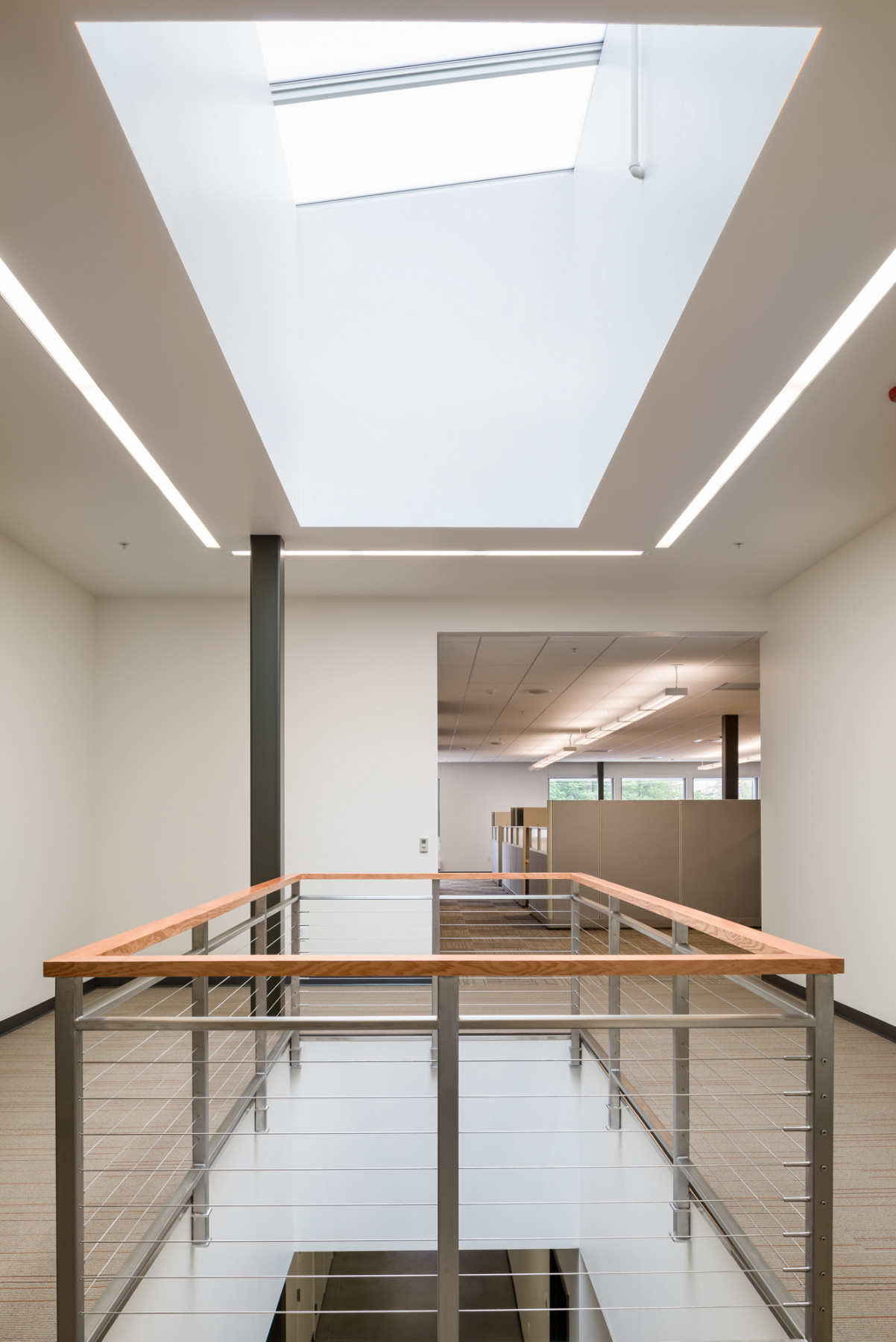 Wood Bannisters And Skylight In A LEED Gold Certified Building.