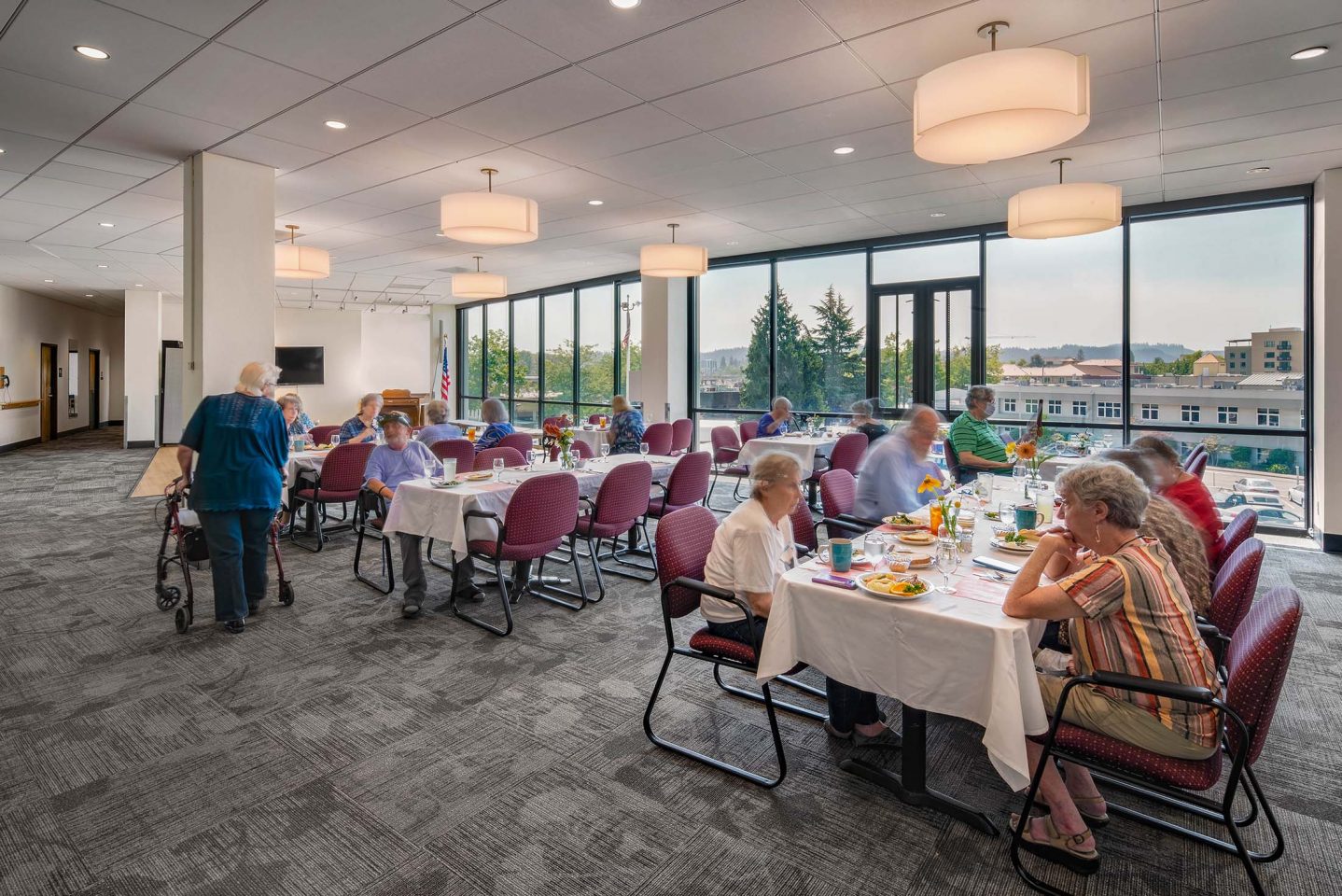 Residents Dining In Community Room