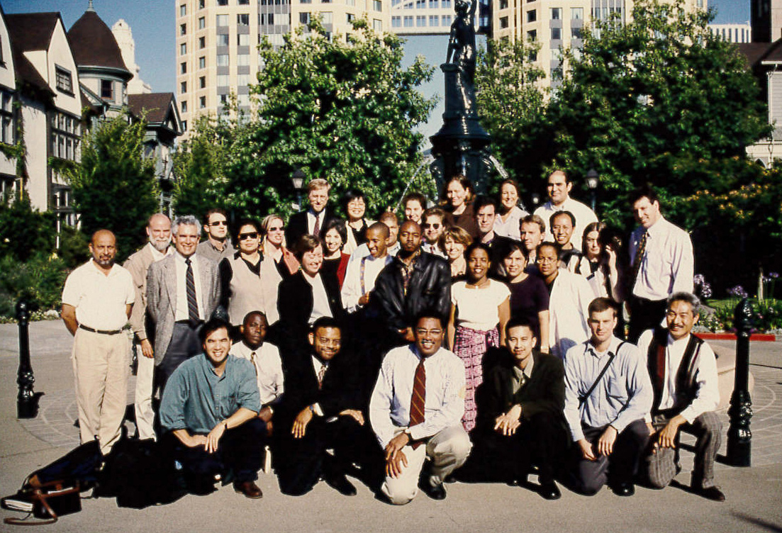 Michael Willis sitting in front of the entire M W A group of about thirty people in 1995