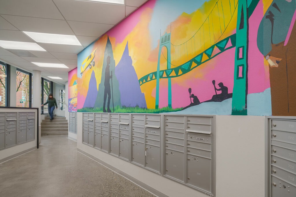 Alder House Mailroom with colorful murals